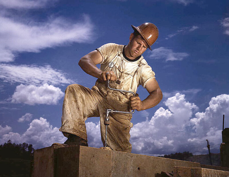 Man Using Hand Drill