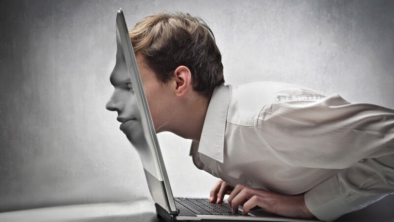 Man Using Laptop — Photograph
