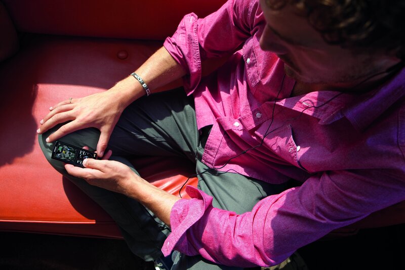 man using music player