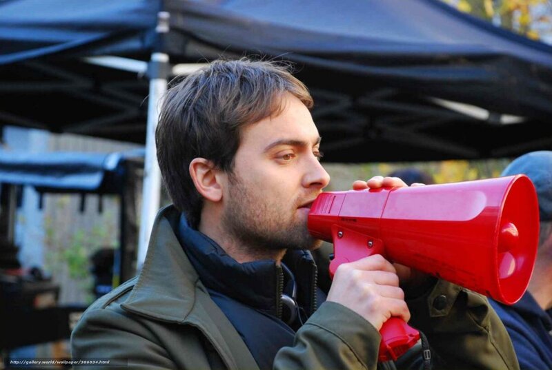 man using red megaphone