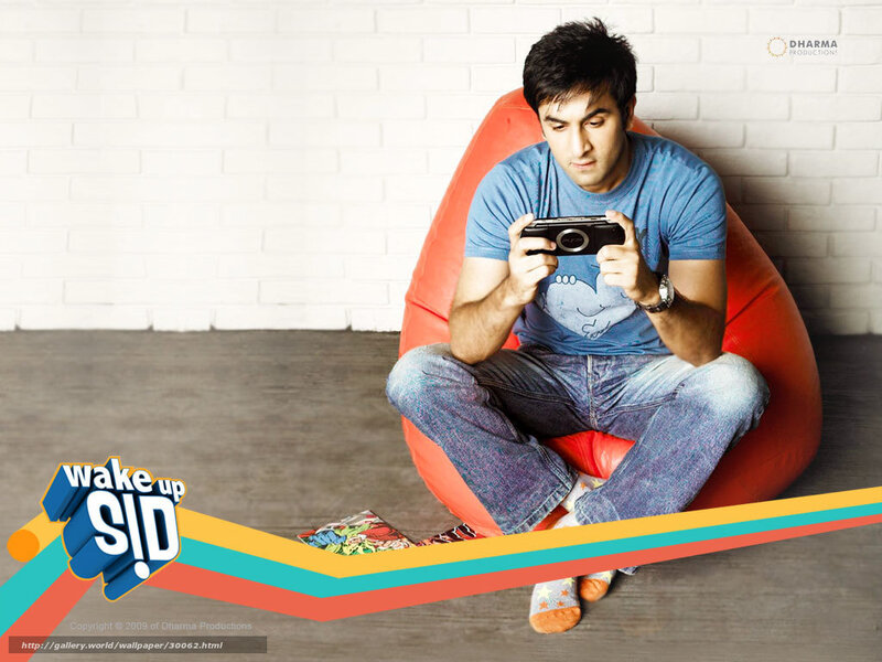man using smartphone on beanbag