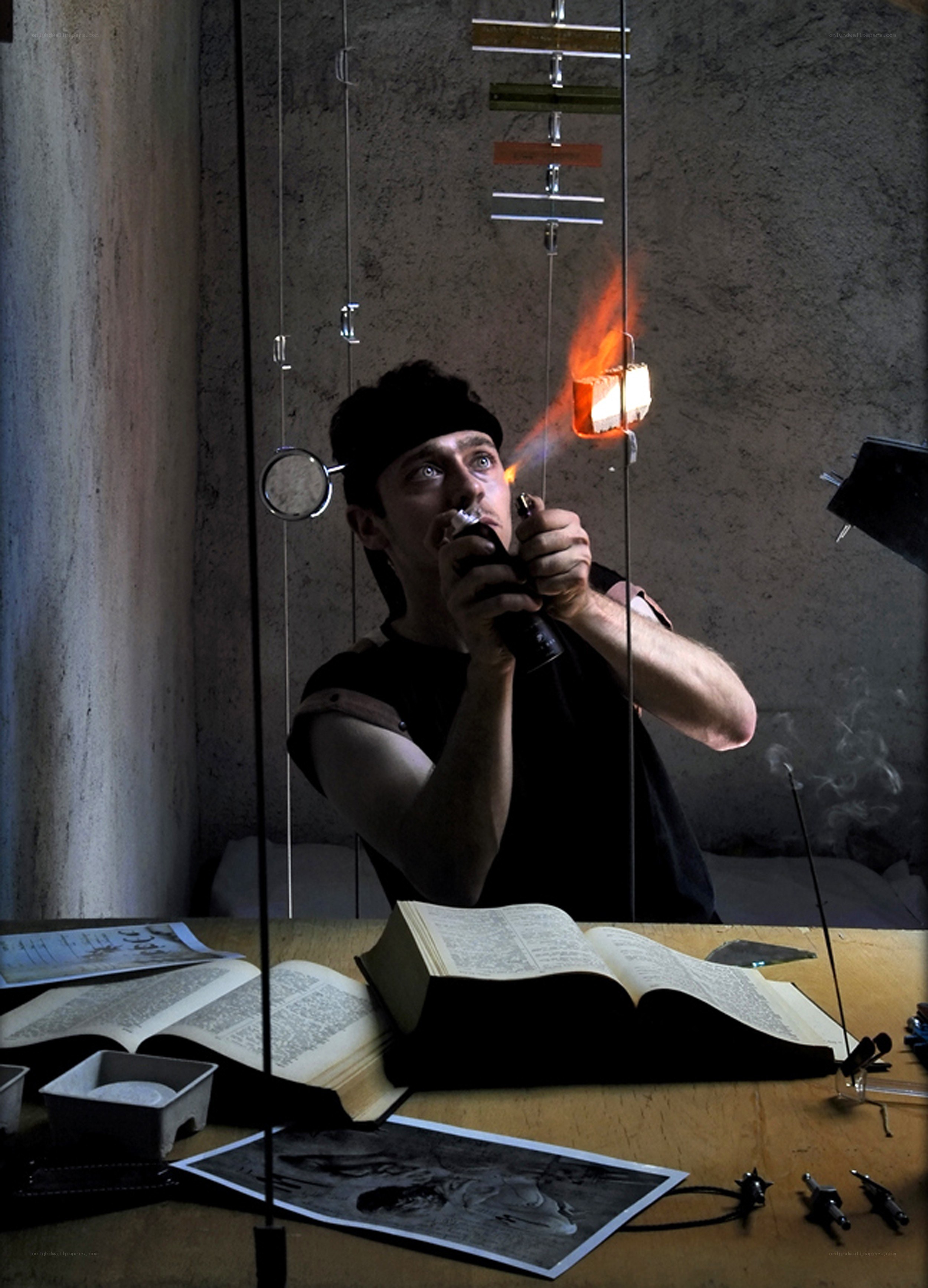 Man using torch in workshop