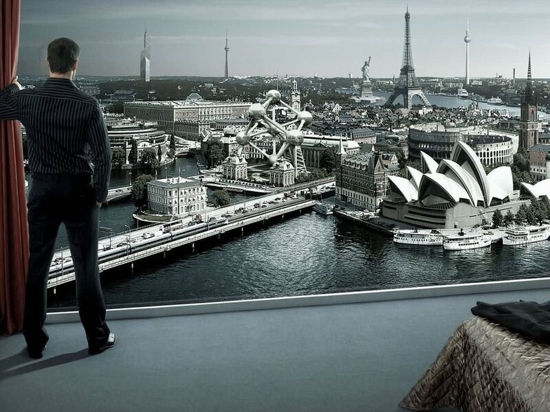 man viewing cityscape collage
