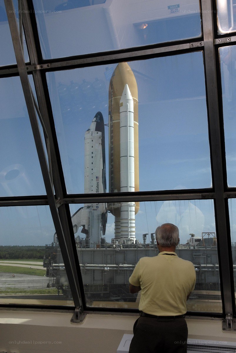 Man viewing space shuttle