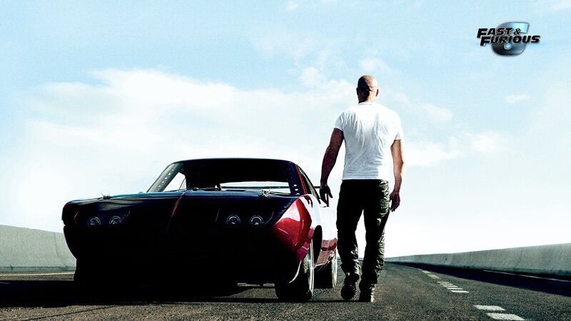 Man Walking Beside Car — Dramatic