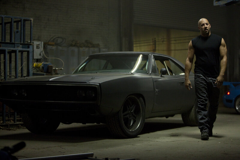 Man Walking Beside Car