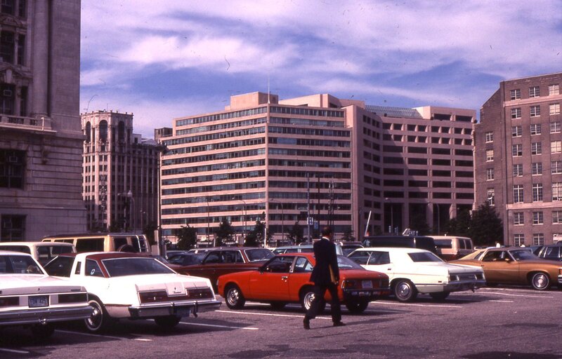 Man walking in a parking lot