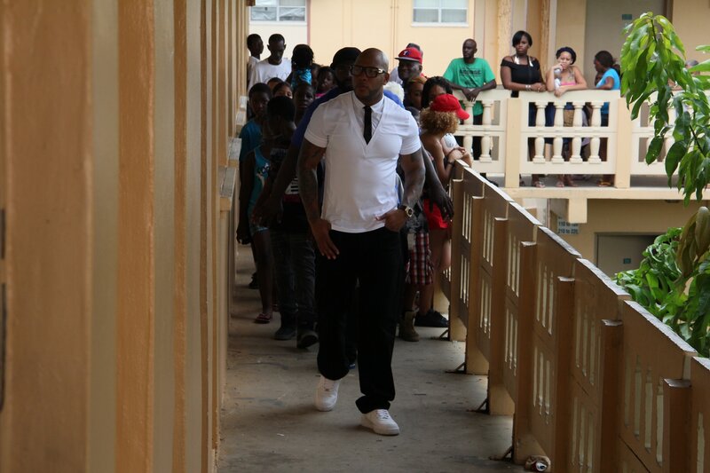 Man Walking in Corridor — White