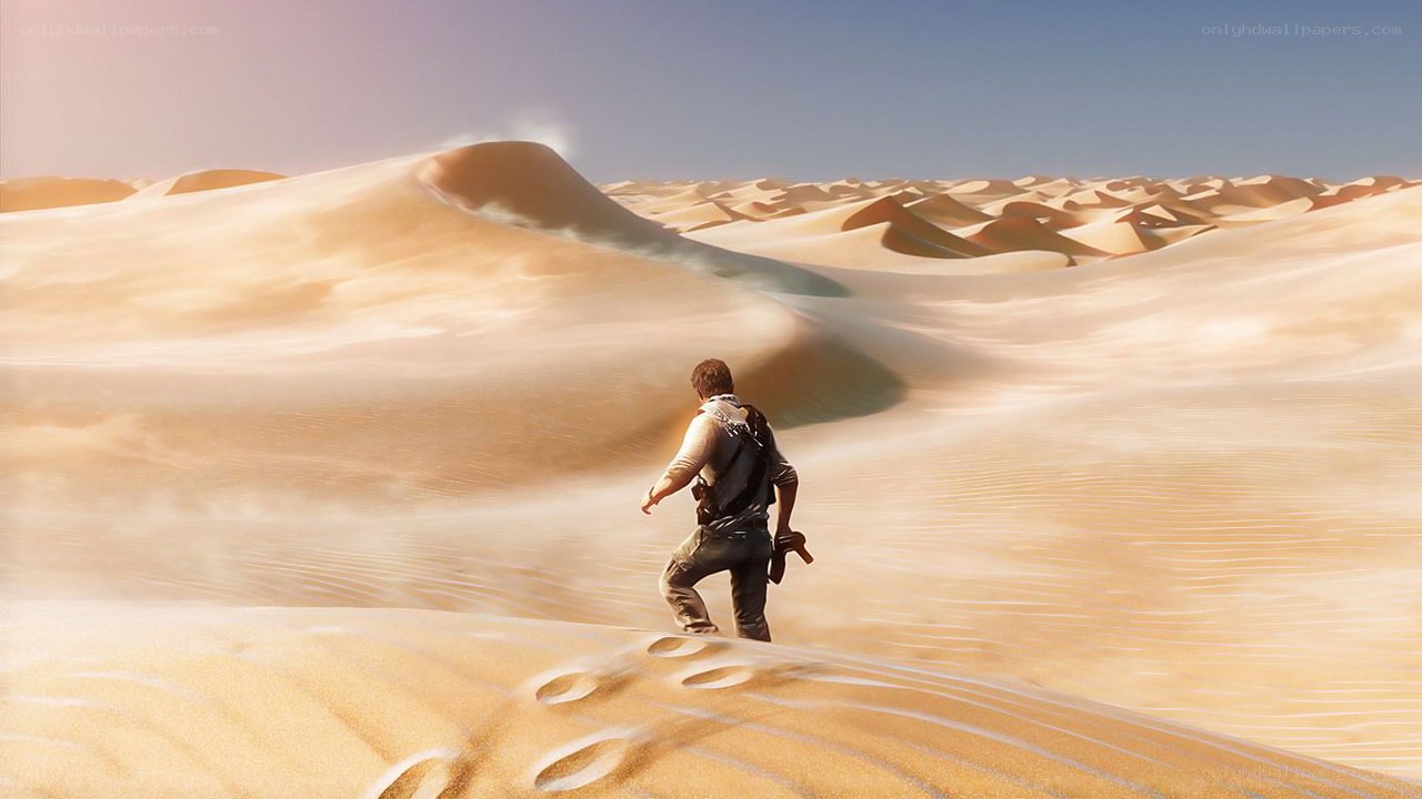 man walking in desert