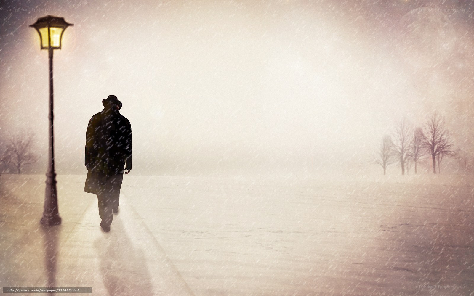 Man walking in snowy night