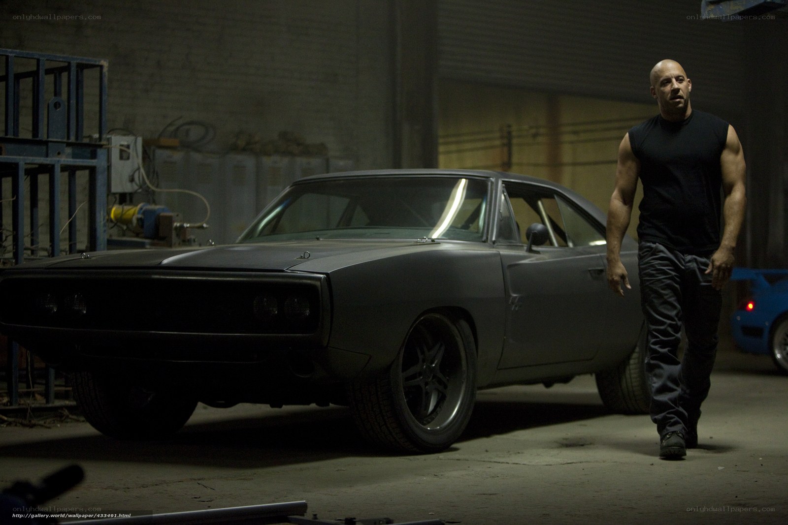 man walking near classic car