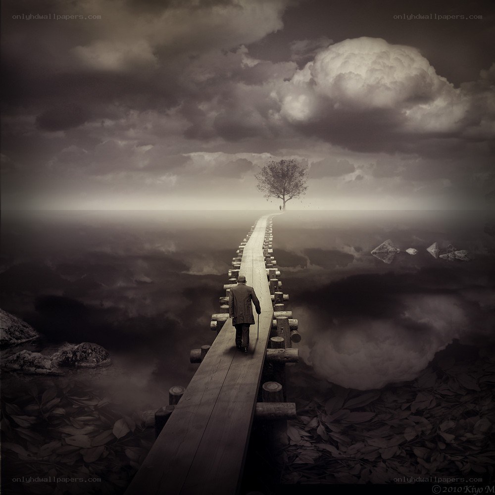 man walking on a bridge
