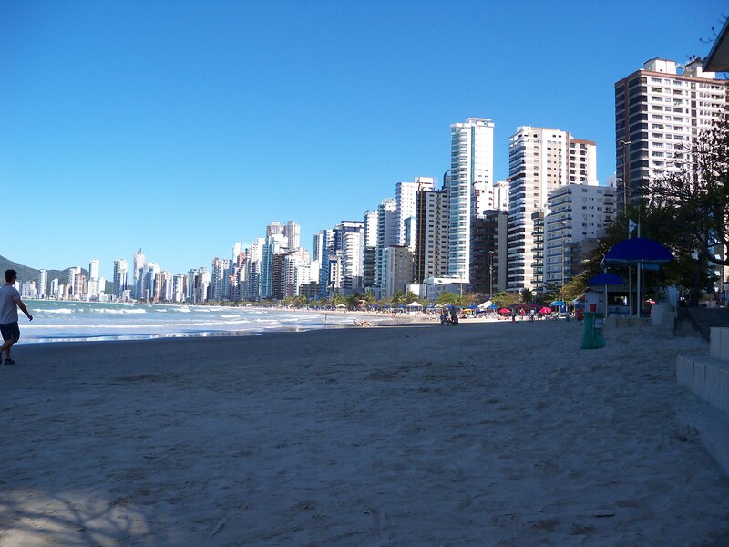 Man Walking on Beach — Blue