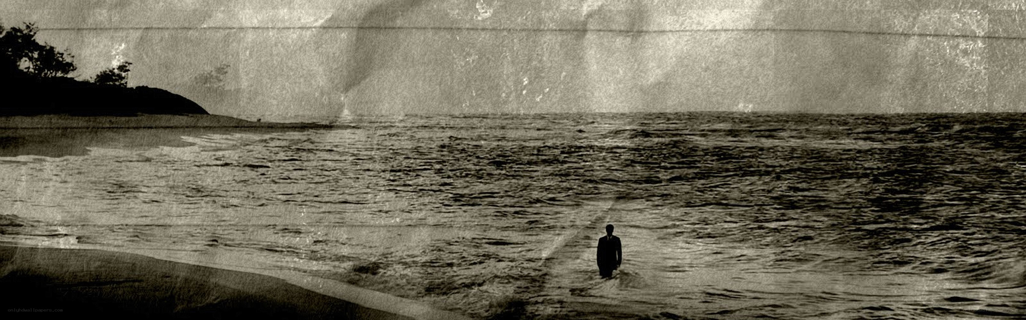 man walking on beach