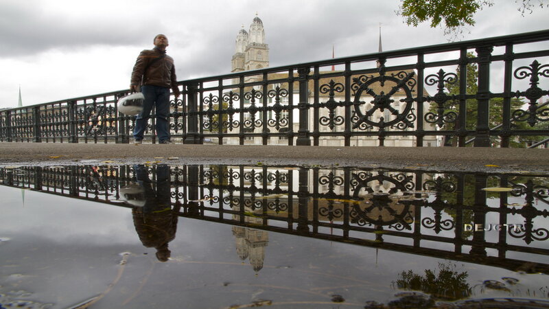 Man Walking on Bridge