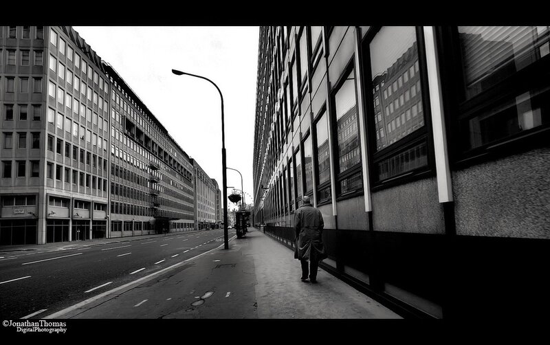 Man walking on city sidewalk