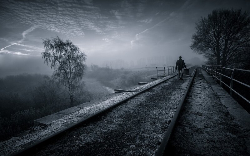 Man Walking on Railway