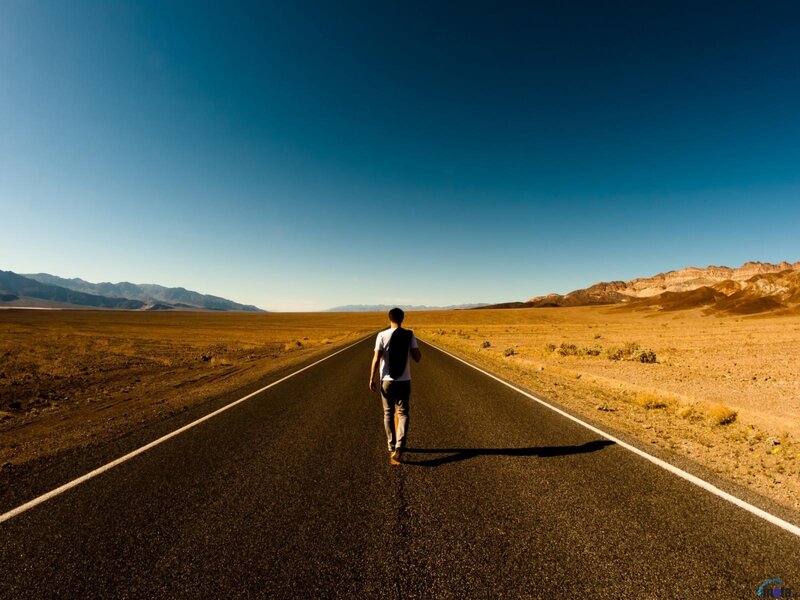 Man Walking on Road — Blue