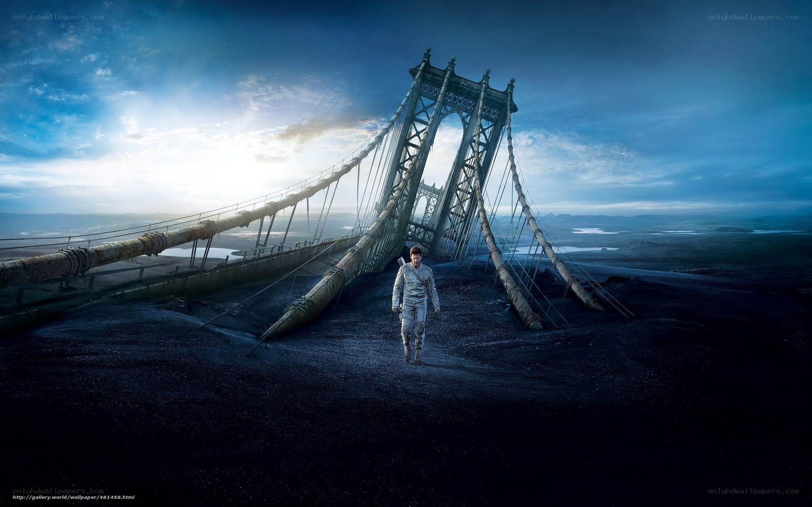 man walking on ruined bridge