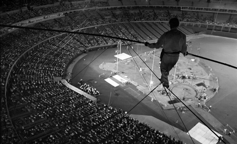 Man walking on tightrope