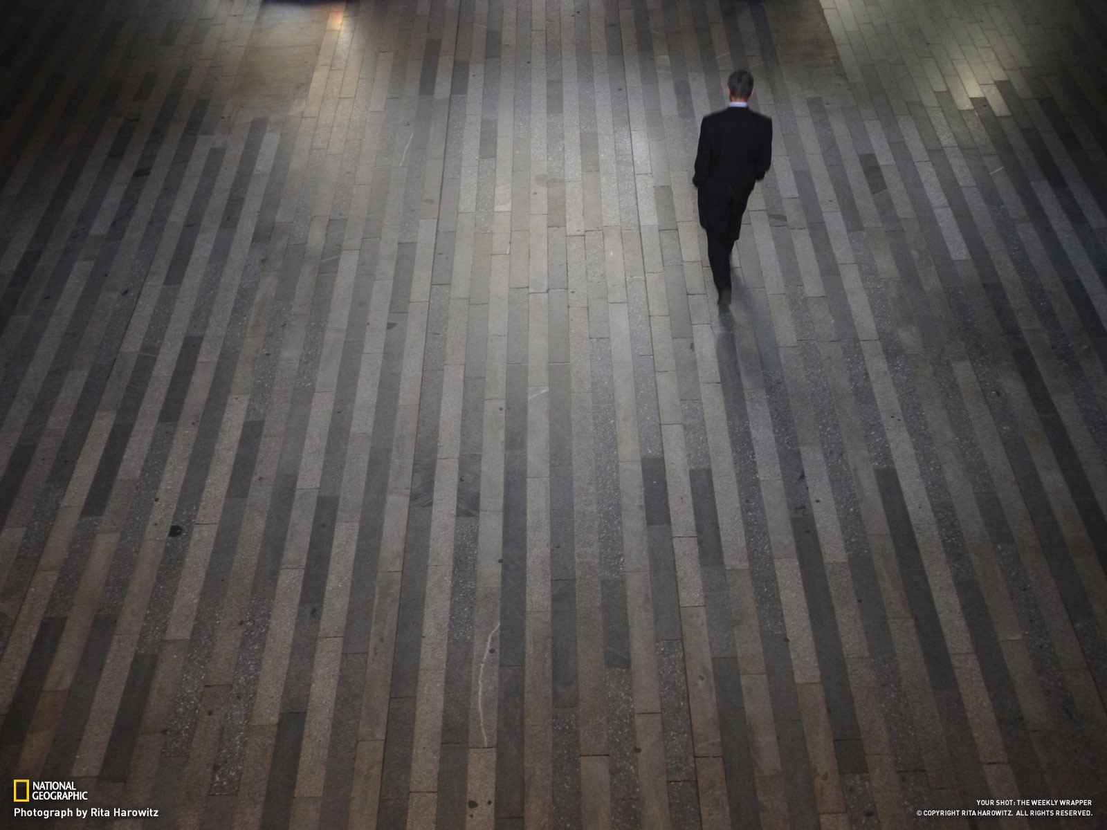 Man walking on tiled floor