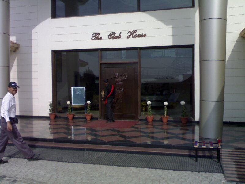 Man Walking Past Building