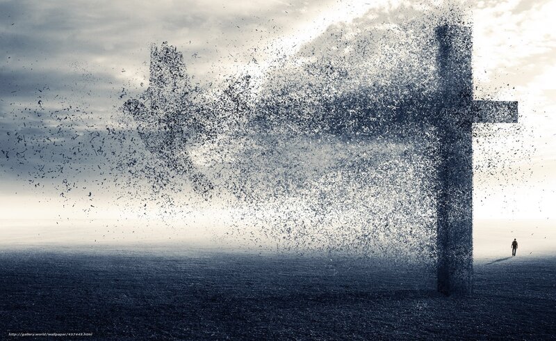 Man walking toward a cross