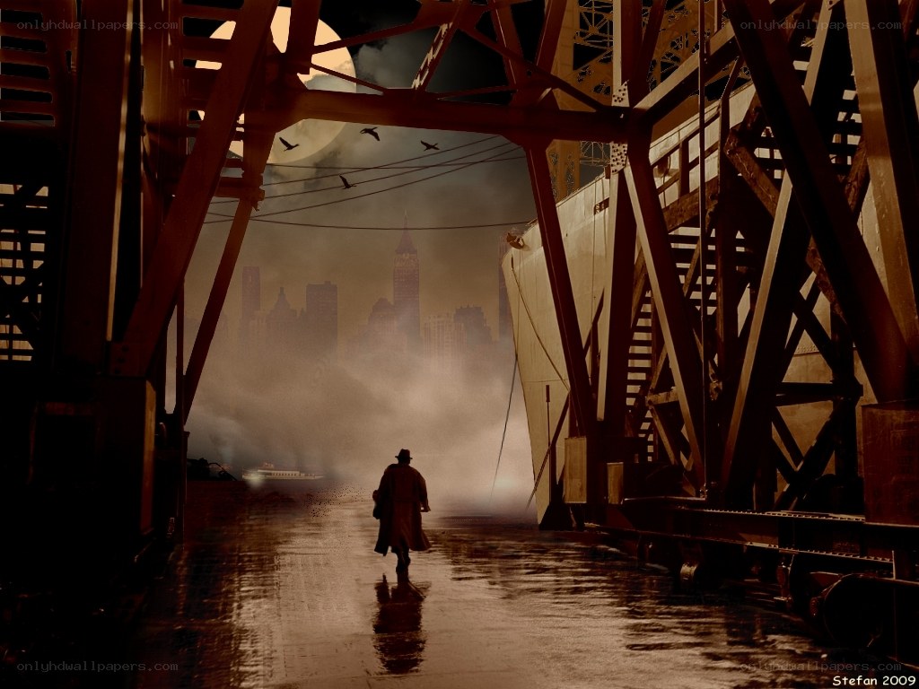 man walking under bridge at night