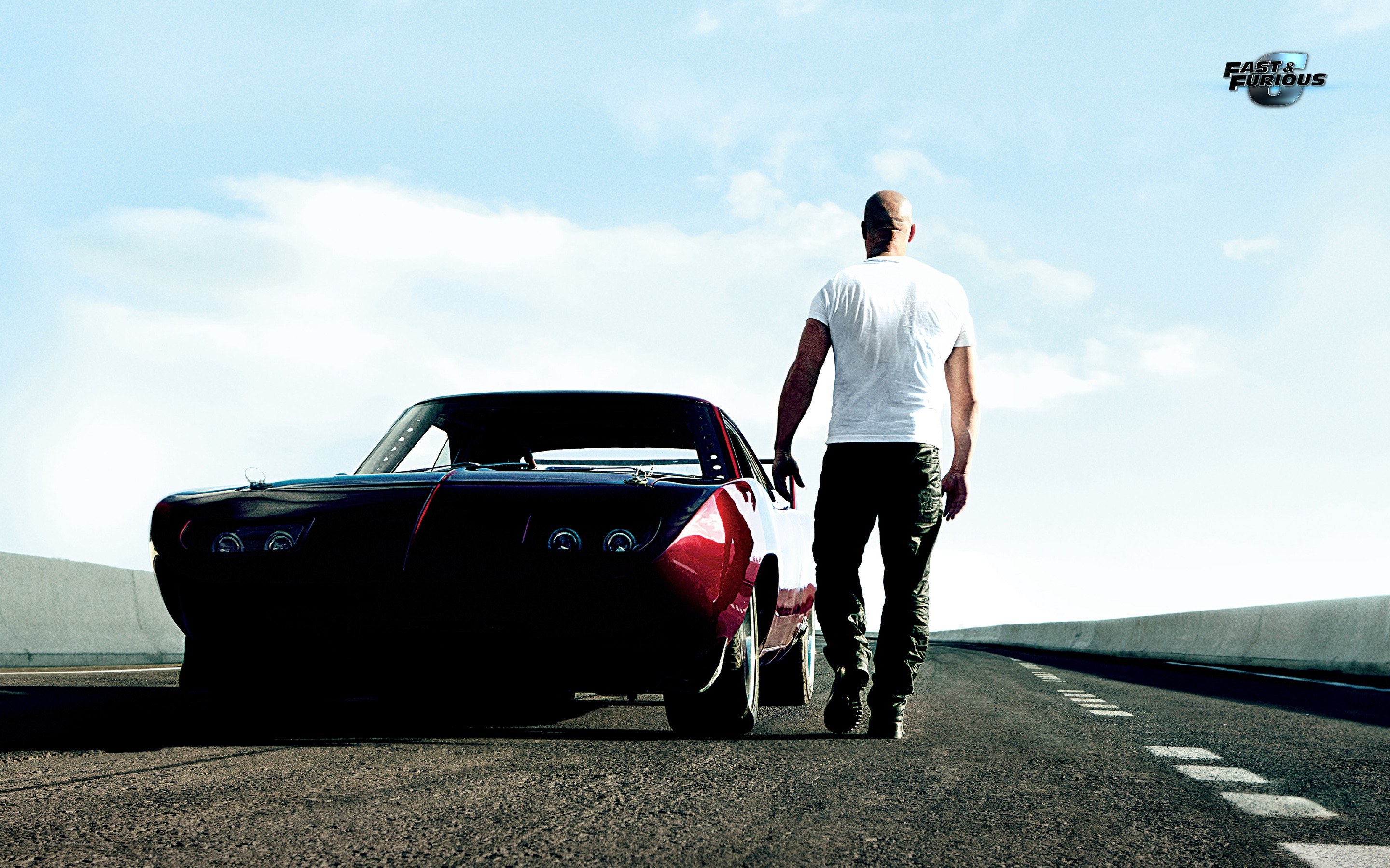 man walking with car on highway