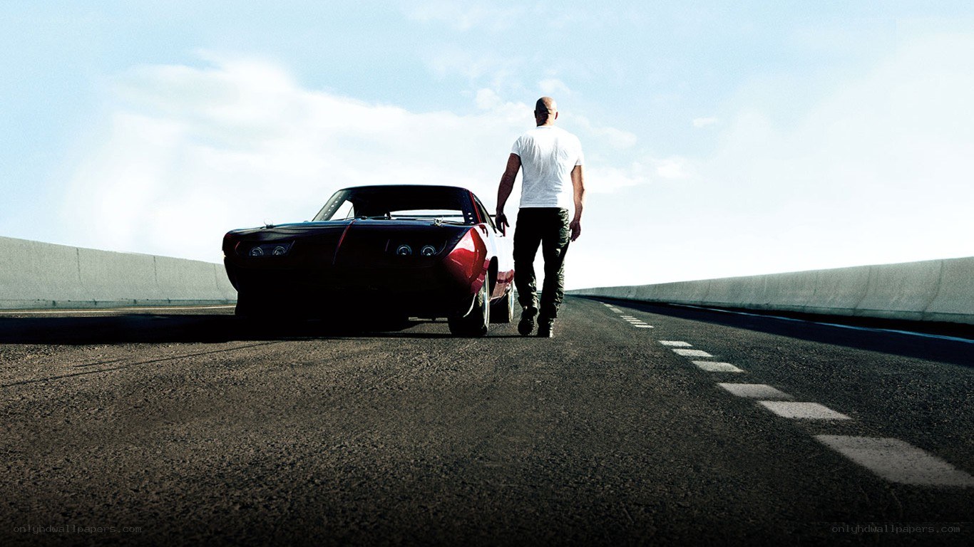 man walking with classic car