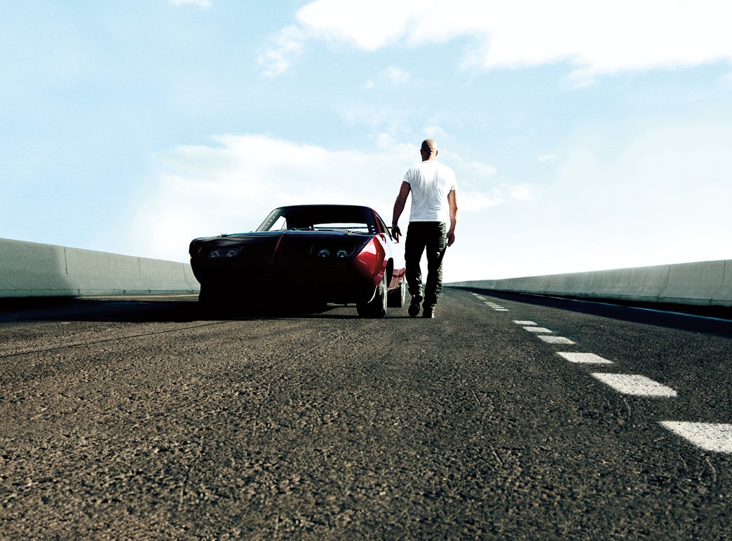 Man walking with classic car