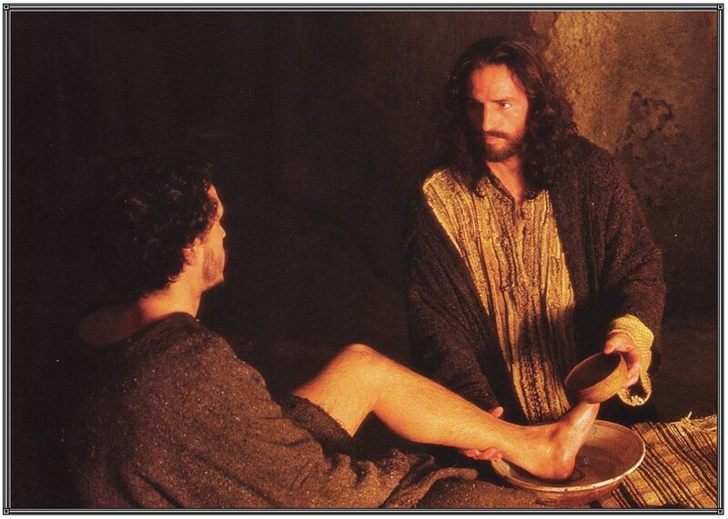 Man Washing Another Man's Feet