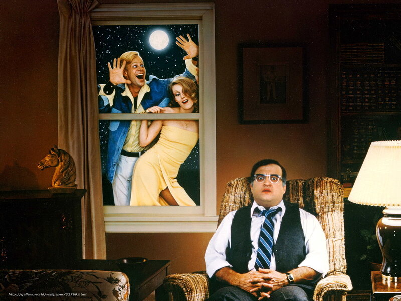 Man watching movie in living room
