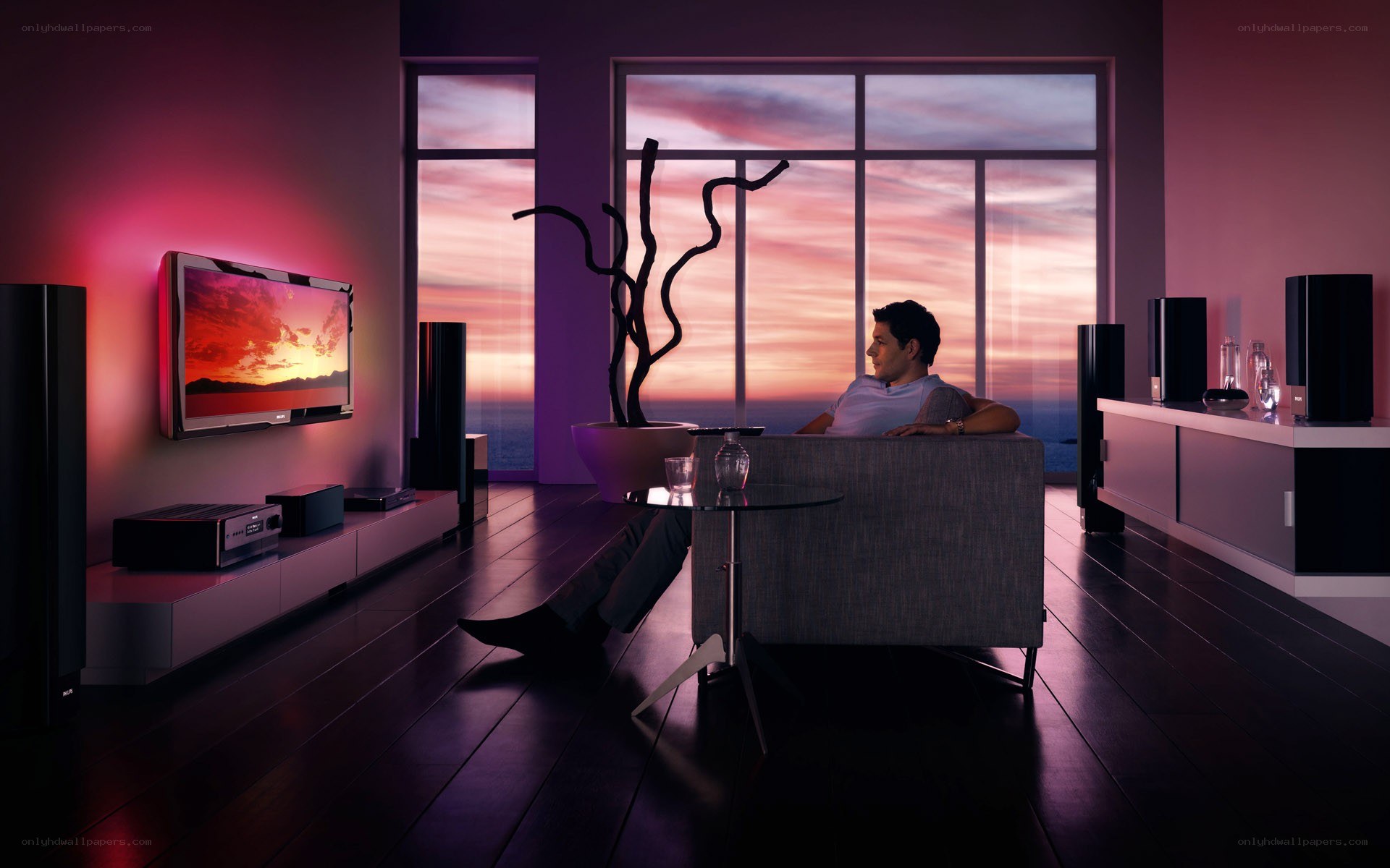 Man watching sunset on TV