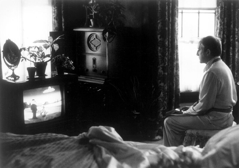 Man Watching Television — Black