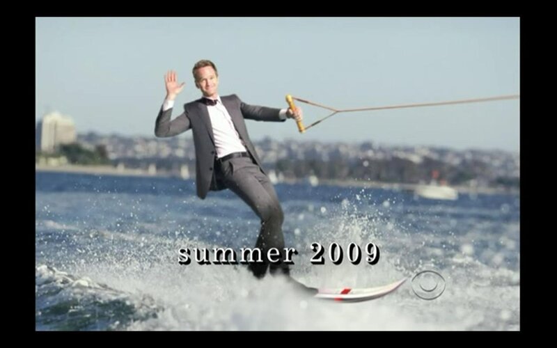 man water skiing in suit