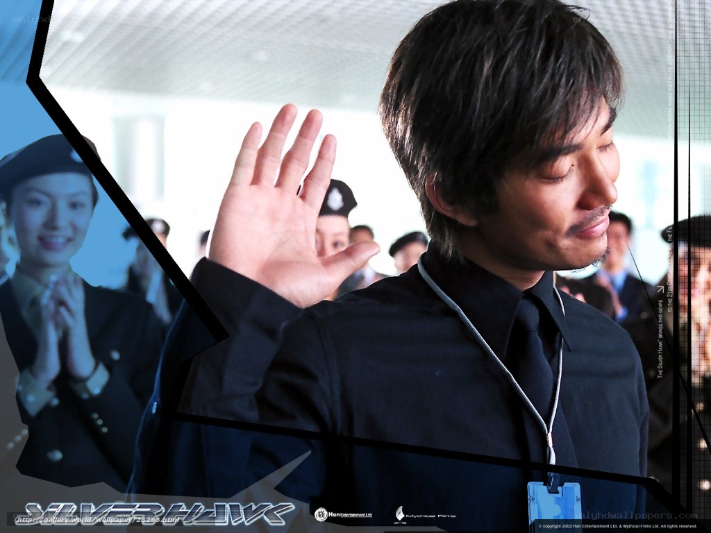 man waving at airport