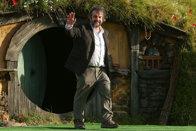 Man Waving at Camera — Green