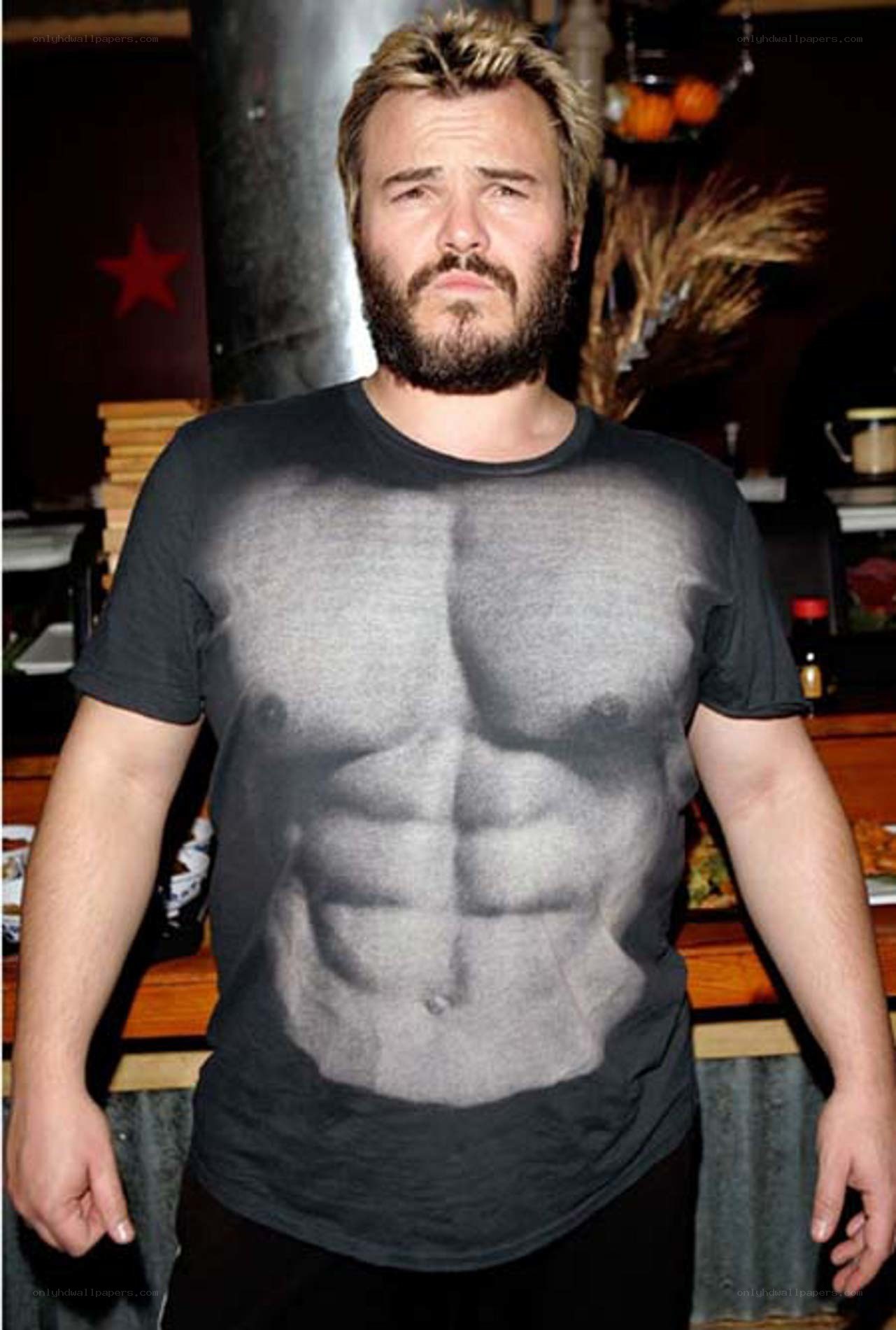 man wearing abs t-shirt