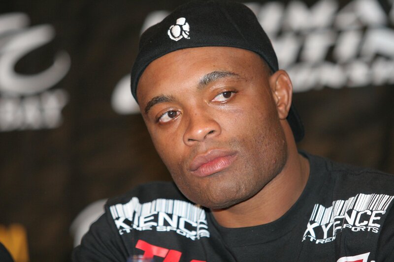 man wearing black cap and t-shirt