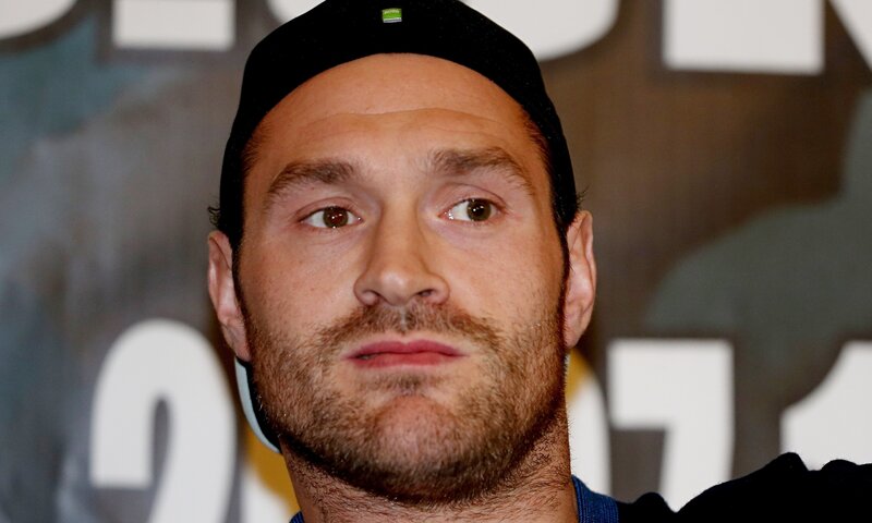 man wearing black cap