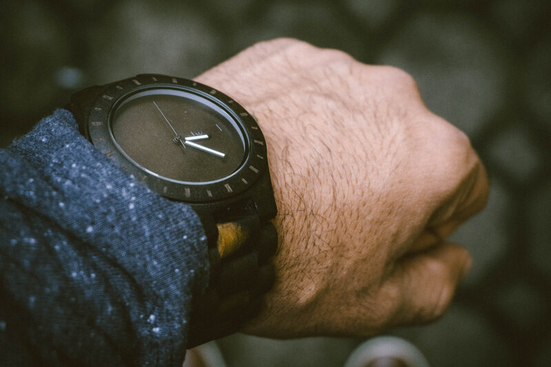 man wearing black watch