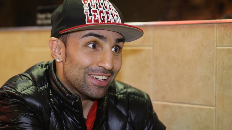 man wearing cap and jacket