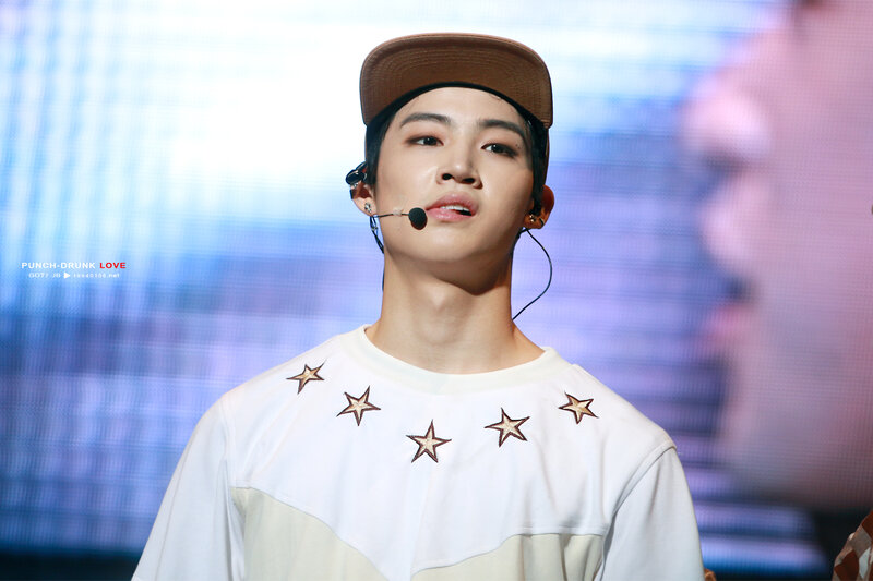 Man Wearing Cap and Stars
