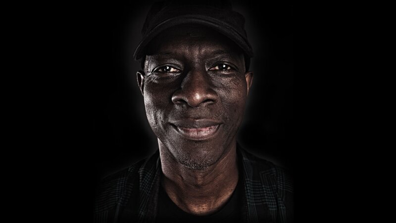 Man Wearing Cap — Black, Dramatic, Photograph