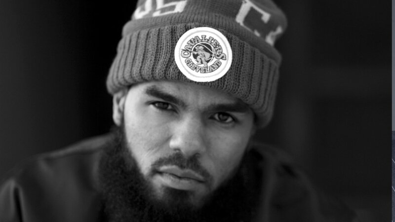 man wearing cleveland cavaliers beanie