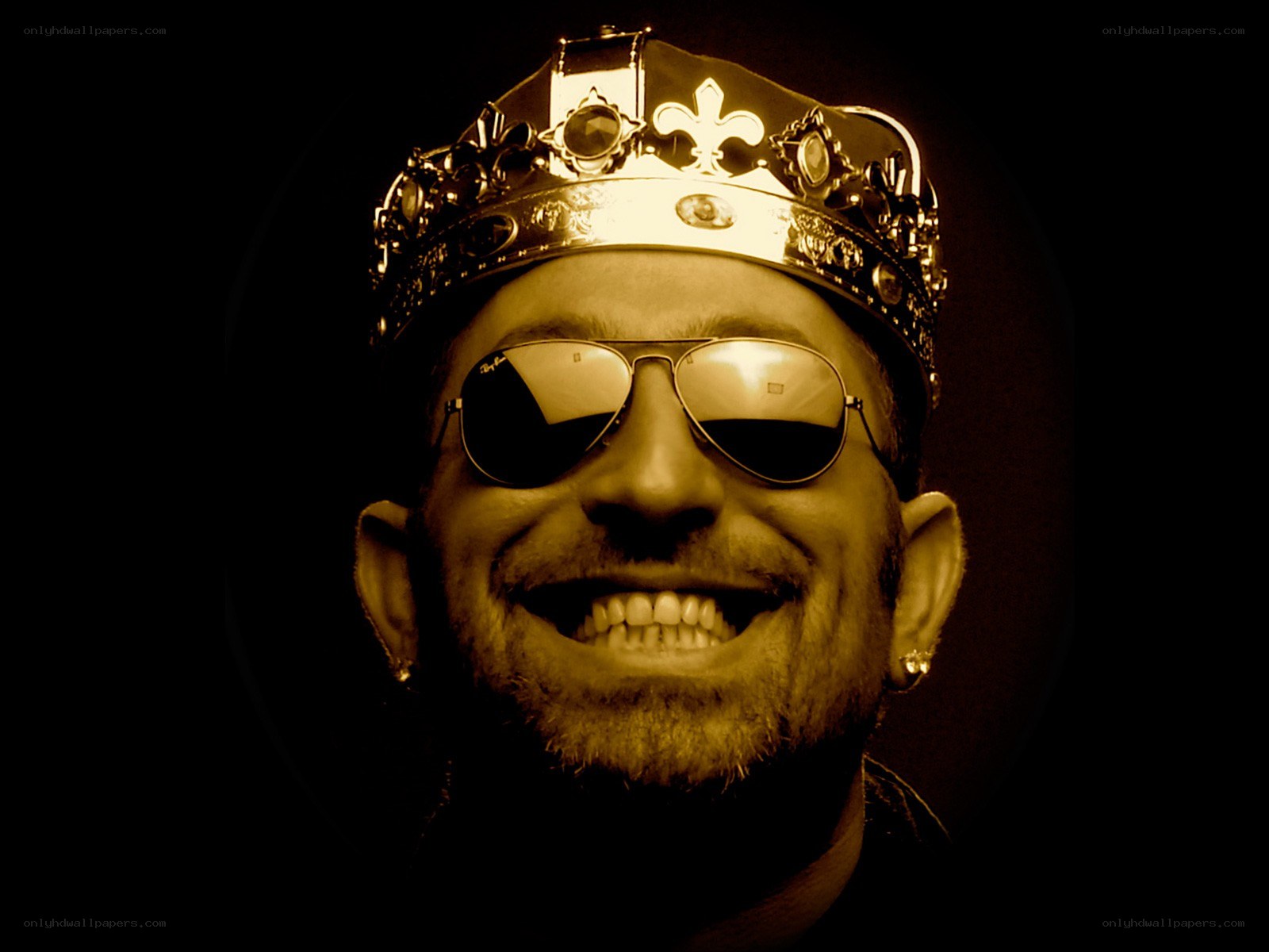 man wearing crown and sunglasses