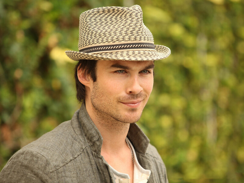 Man Wearing Fedora Hat — Green