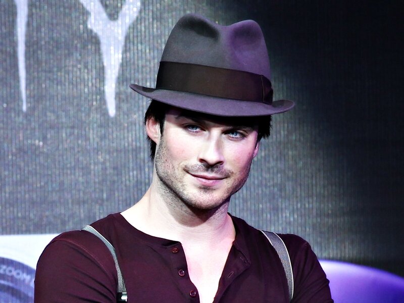 Man Wearing Fedora Hat — Purple