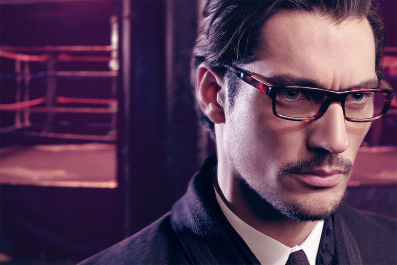 man wearing glasses in suit